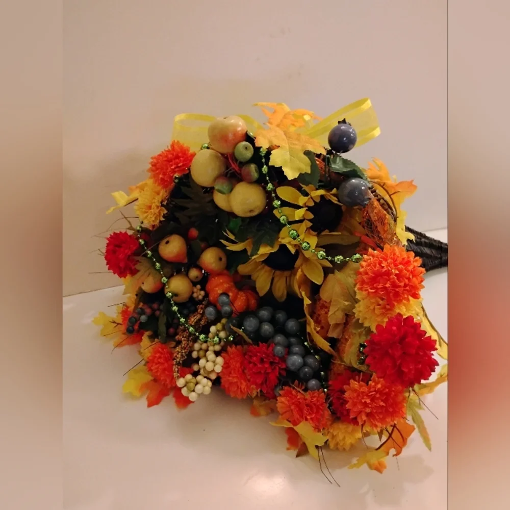 Autumn Harvest Cornucopia with Vibrant Accents Berries Leaves Beads Ribbons